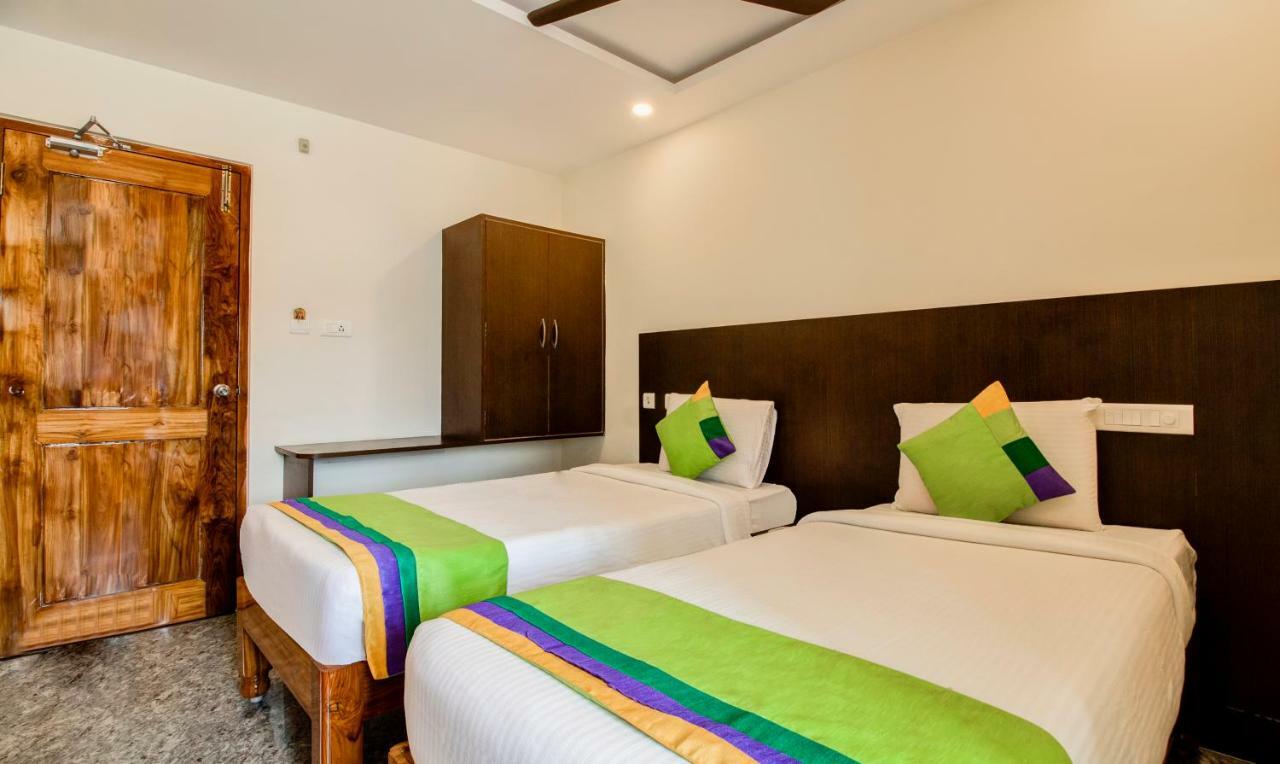 Treebo Sls Grand Hotel ตีรูปาติ ภายนอก รูปภาพ