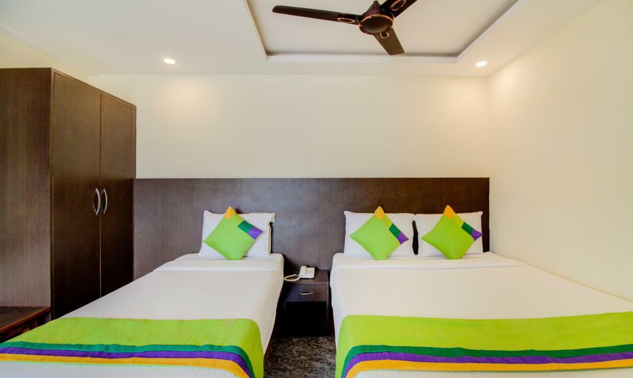 Treebo Sls Grand Hotel ตีรูปาติ ภายนอก รูปภาพ
